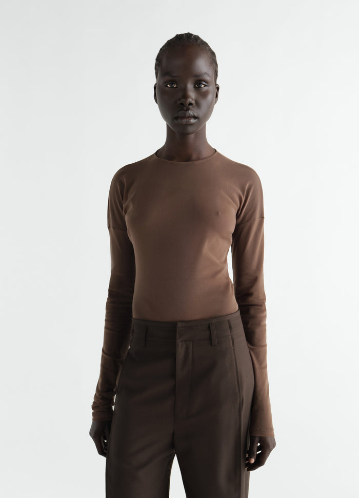 Long-sleeve ballerina-style top in brown mesh jersey by LEMAIRE worn by model front view