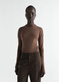 Long-sleeve ballerina-style top in brown mesh jersey by LEMAIRE worn by model front view