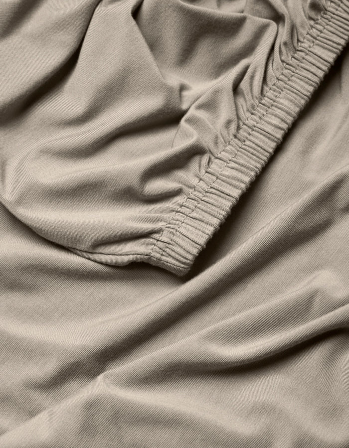 A close-up of the Cozy Earth Bamboo Jersey Fitted Sheet fabric.|Color:Driftwood