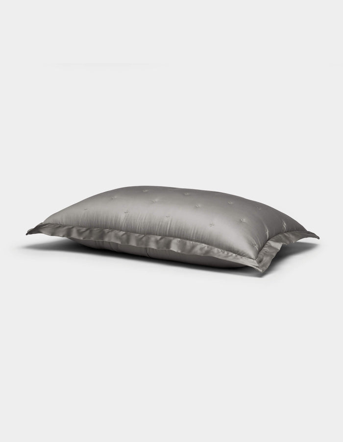 A single Cozy Earth Bamboo Quilted Sham in gray with a subtle star pattern is displayed on a plain white background.|Color:Charcoal