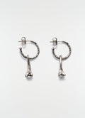 Clove silver metal earrings with textured hoop and clove detail by LEMAIRE on white background