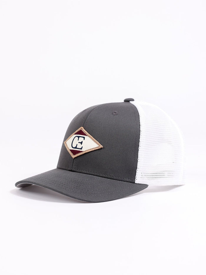 Studio shot of charcoal/white diamond mesh trucker hat showing the side |Color:Charcoal/White