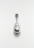 Blown glass silver-tone earring with chain detail by LEMAIRE on plain white background close-up