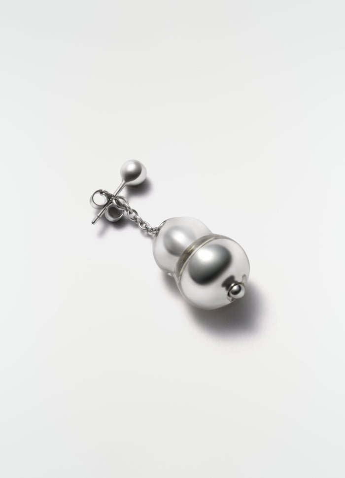 Blown glass silver-tone single earring with chain detail by LEMAIRE on plain white background