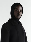 Balaclava in black worsted wool by LEMAIRE worn by model front close-up on white background