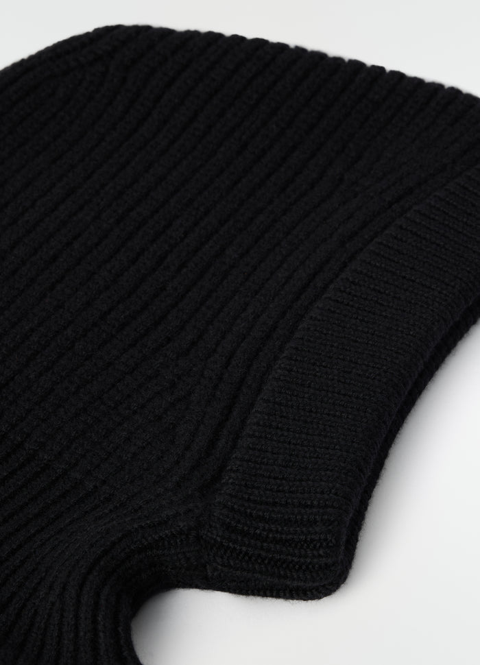 Balaclava black worsted wool ribbed knit close-up detail in white background LEMAIRE