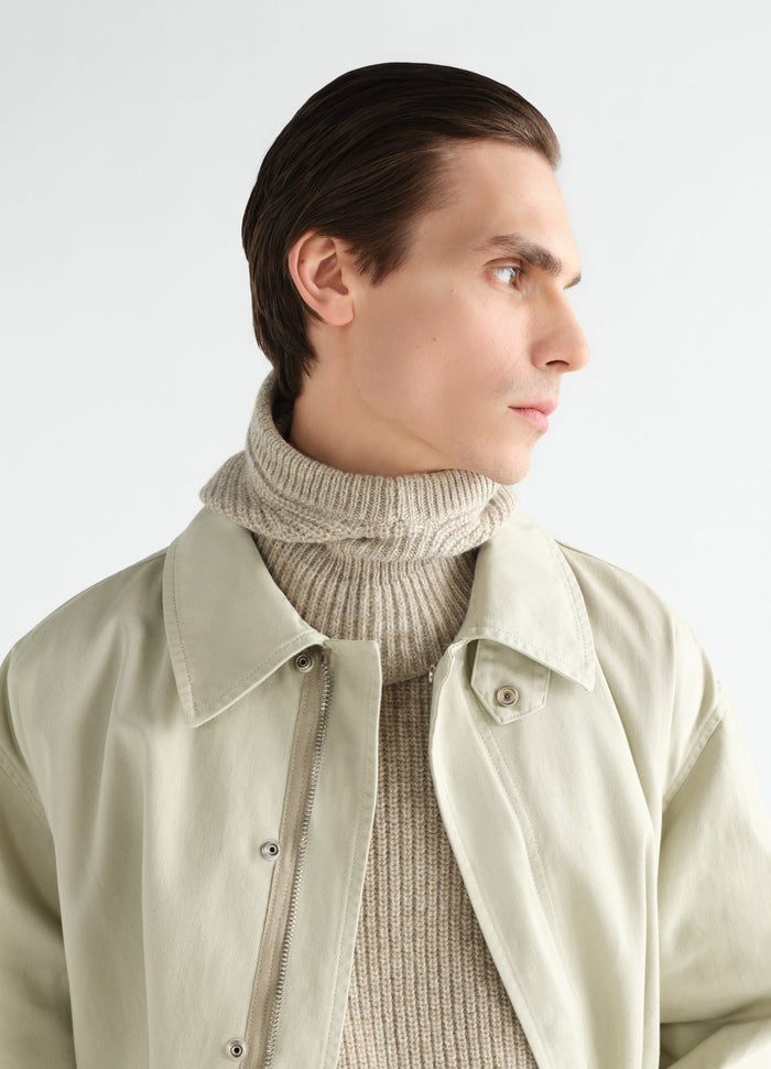 Balaclava in beige alpaca and yak wool blend worn by model with beige jacket front view LEMAIRE
