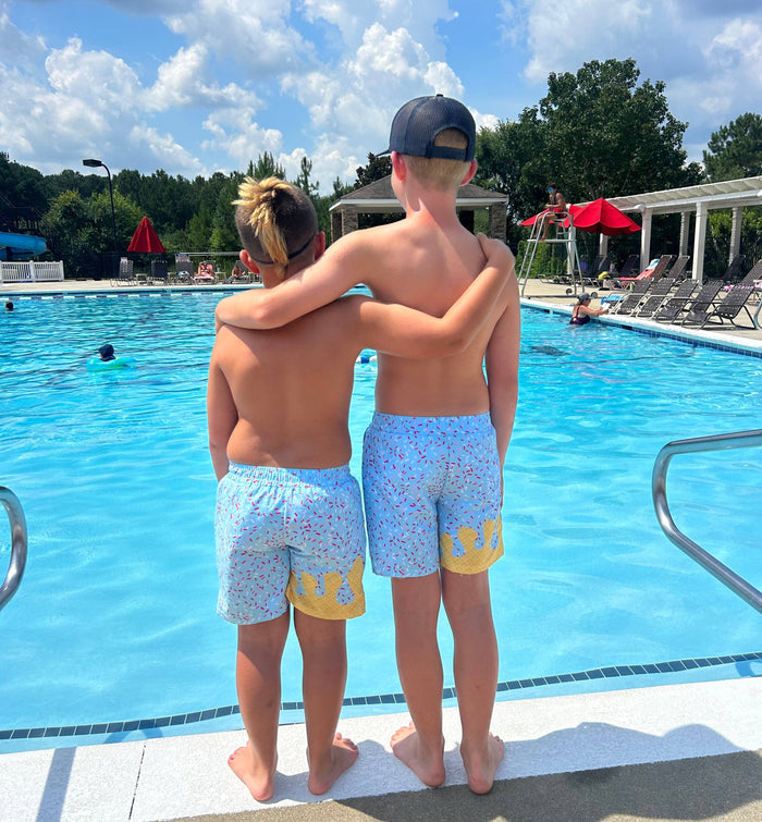 Ice Cream Drip swim trunks pink