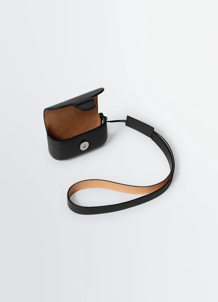 IL BUSSETTO FOR LEMAIRE AIRPODS PRO in Molded vegetable-tanned leather, product shot, angled top view open case with strap