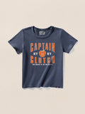 Navy blue t-shirt with a "Captain Clutch" graphic on the center front against a beige background