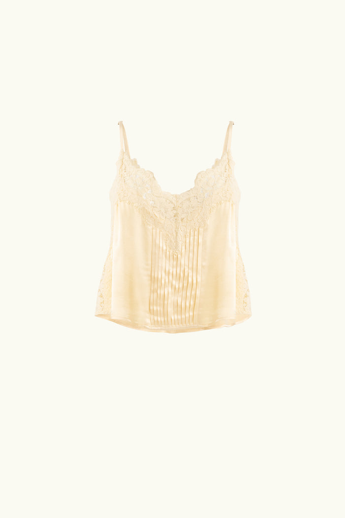 Vanilla lace-trimmed camisole on a white background