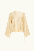 Vanilla lace-lined long sleeve top on a white background