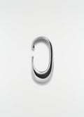 Long silver metal drop earcuff LEMAIRE shot on plain white background detail view