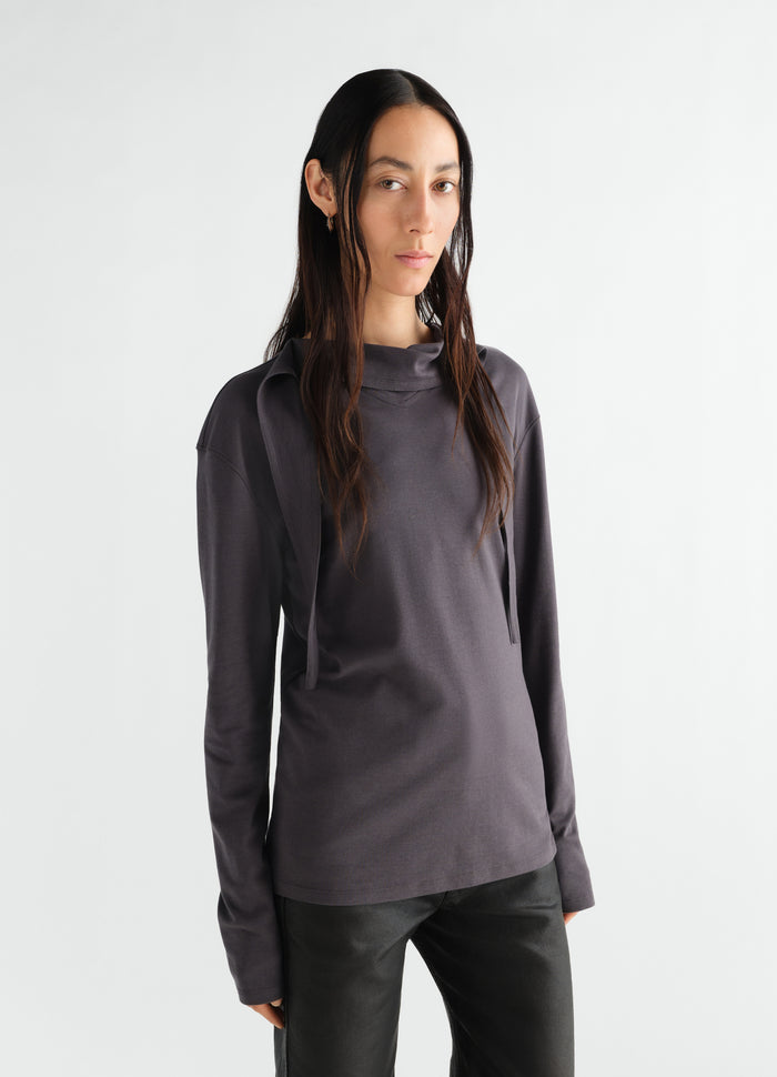 Long-sleeve charcoal silky jersey crepe scarf top by LEMAIRE worn by model front view
