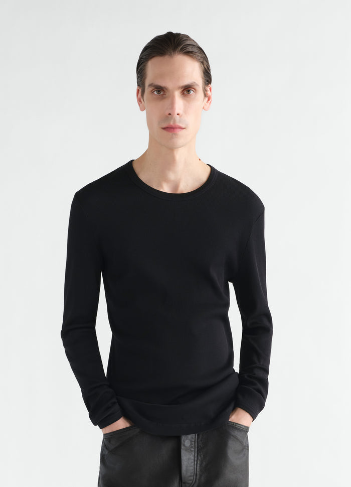 Long-sleeve black ribbed jersey top LEMAIRE worn by model front view main look