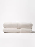 Two luxe bath sheets folded with white background |Color:Seashell