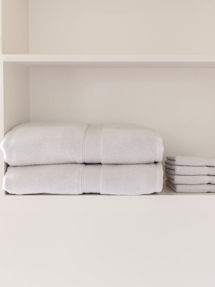 Light grey luxe bath sheets and washcloths on shelf |Color:Light Grey