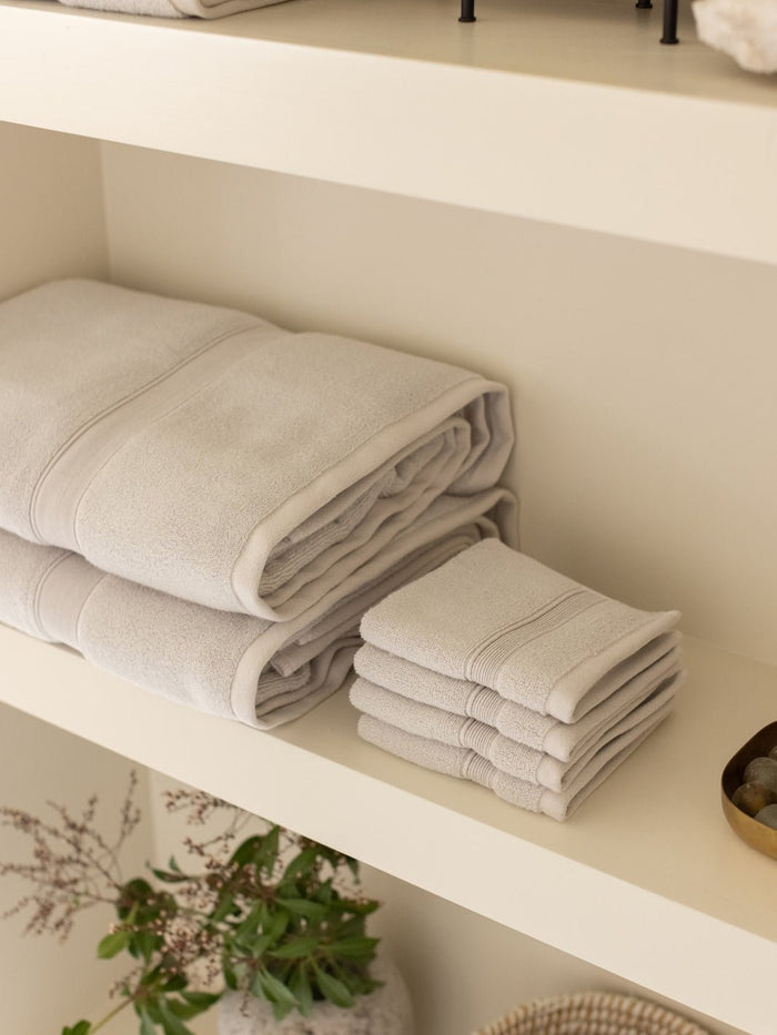 Light grey luxe towels and washcloths folded on shelf |Color:Light Grey