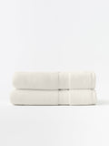 Seashell luxe bath towels folded with white background |Color:Seashell