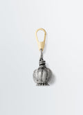 Maxi Thistle Bag Charm by LEMAIRE in silver and gold metal with detailed thistle design close-up on white background