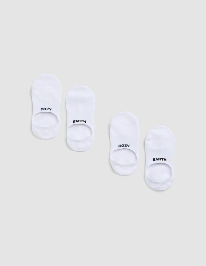 Two pairs of Cozy Earth Essential No-Show Socks are displayed on a light gray background. Each pair features "COZY" on one sock and "EARTH" on the other, both printed in black near the toes. |Color:White