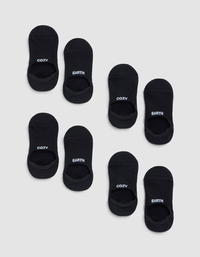 Eight pairs of black Essential No-Show Socks from Cozy Earth on a light gray background—four pairs read "COZY" and four read "EARTH" in white lettering on top. |Color:Black