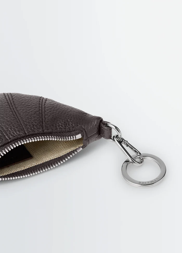 Mini Croissant Keyring in Grained Leather, product shot, close-up detail zipper and keyring focus