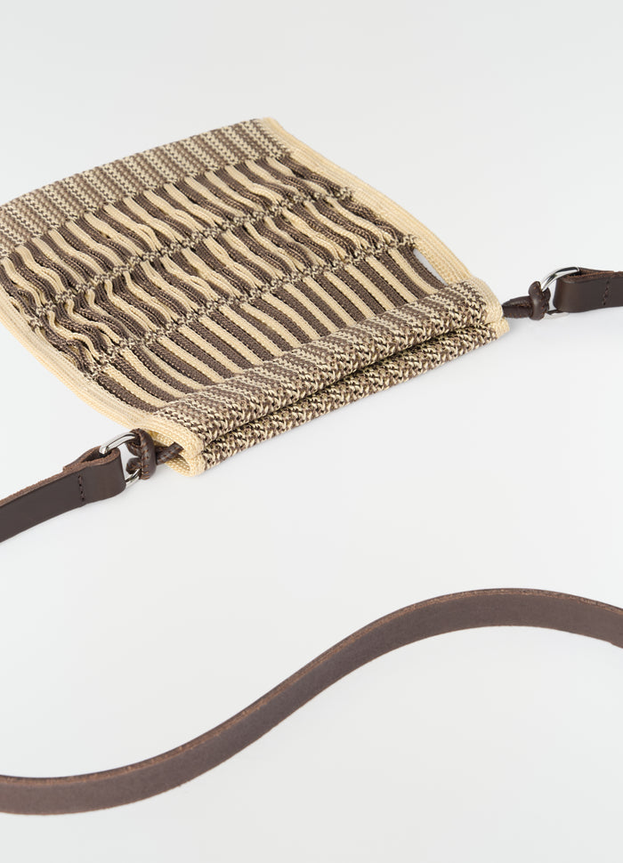 Mini crossbody filt net bag in beige and brown with leather strap LEMAIRE flat lay on white background