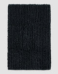 The Cozy Earth Plush Loop Bath Mat, rectangular and dark gray with thick textured fibers, is displayed on a plain light gray background.|Color:Graphite