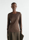 Rib long sleeve brown jersey top by LEMAIRE worn by model front view with relaxed fit