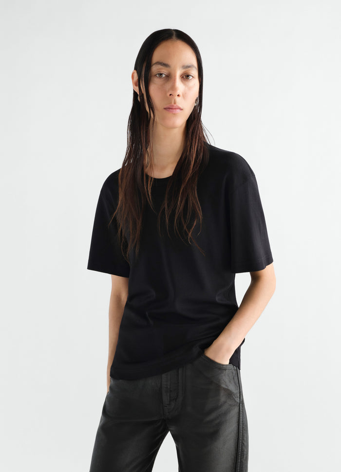 Rib black cotton jersey T-shirt by LEMAIRE worn by model front view main look