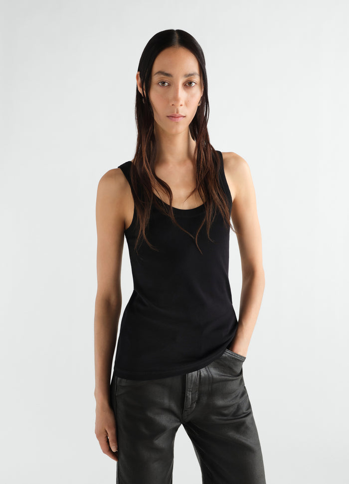 Rib black cotton jersey tank top LEMAIRE worn by model front view with black leather pants