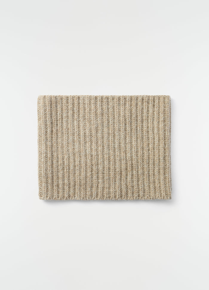 Neck warmer in beige alpaca and yak wool blend by LEMAIRE styled flat on white background