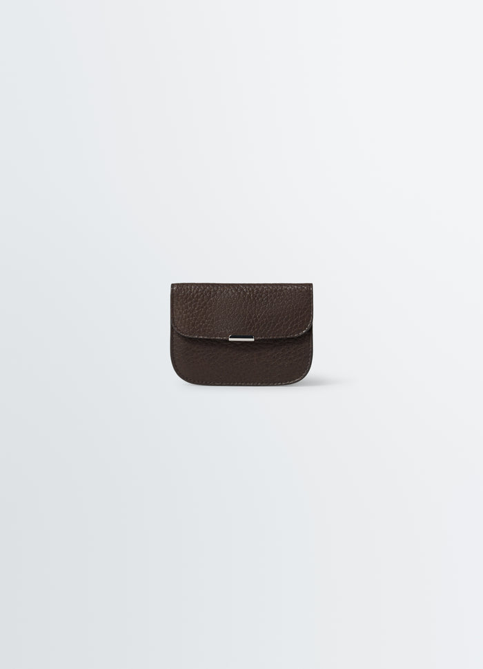Soft brown leather card holder with silver clasp by LEMAIRE on plain white background front view.