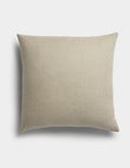 The Sonoma Throw Pillow by Cozy Earth is a square, beige cushion featuring a plain fabric texture, displayed against a white background with a soft shadow to the left.|Color:Tallow |Size:26" x 26"