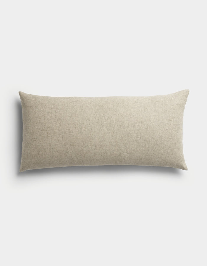 The Sonoma Throw Pillow by Cozy Earth is a rectangular, beige accent pillow featuring a smooth fabric texture, displayed against a plain white background.|Color:Tallow|Size:14" x 30"