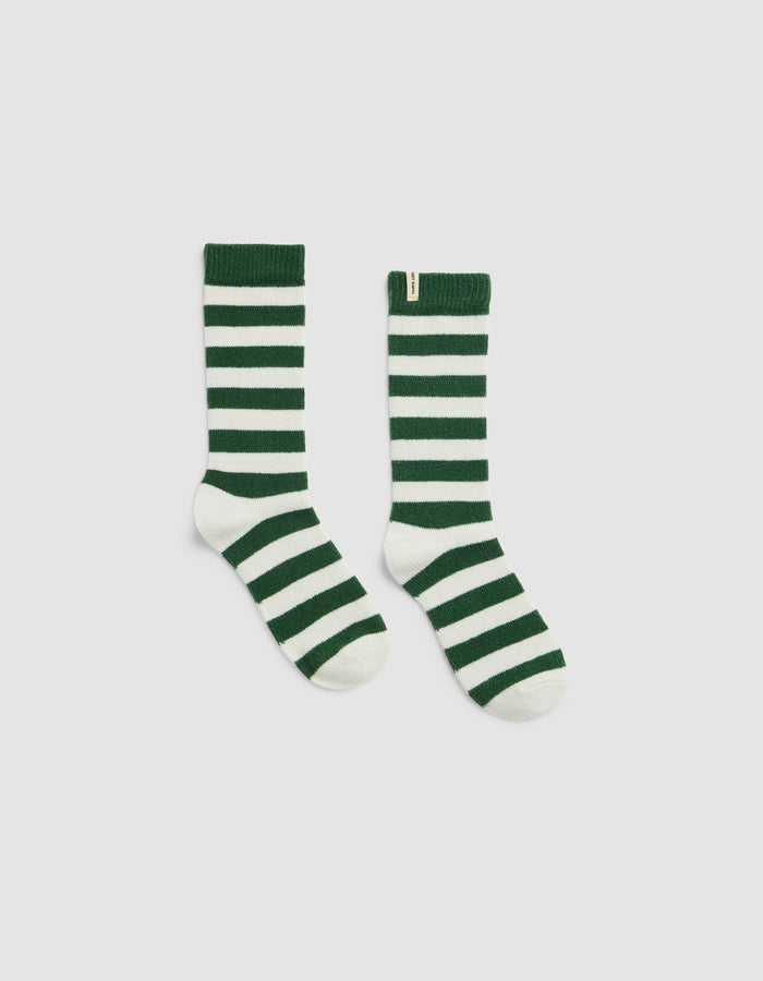 The Plush Modern Crew Sock by Cozy Earth features green and white stripes with solid green cuffs, heels, and toes, shown against a plain light background.|Color:Celadon Stripe