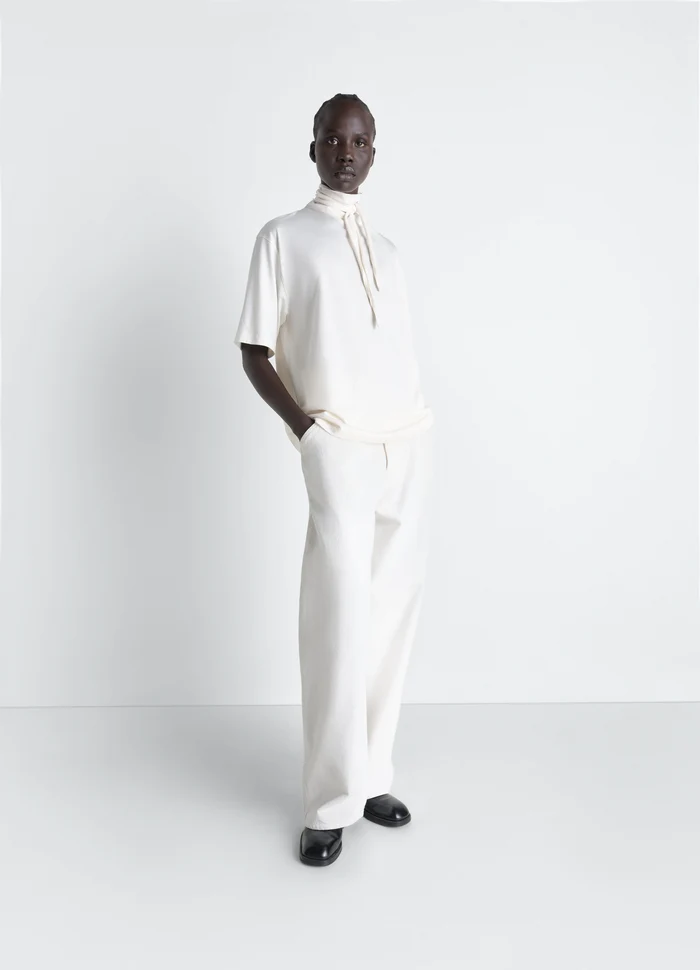 Lemaire T-Shirt with Foulard in Light Mercerised Cotton Jersey, model shot, side view loose fit with neck tie
