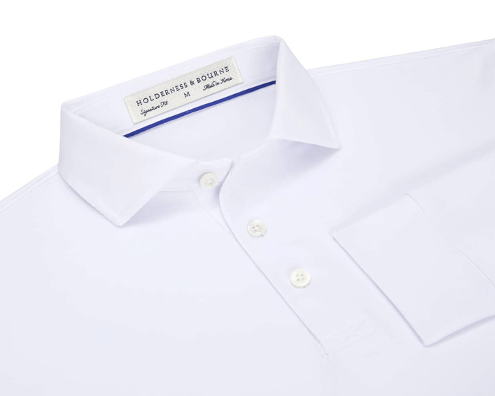 The Abbott Shirt: White, features a long-sleeved, collared design with a three-button placket, chest pocket, and contrast collar band piping, showcasing Holderness & Bourne's signature fit.