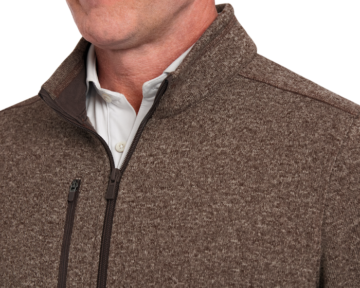 Holderness & Bourne Men’s Chestnut Fleece Jacket worn by a person with a white shirt underneath on a white background