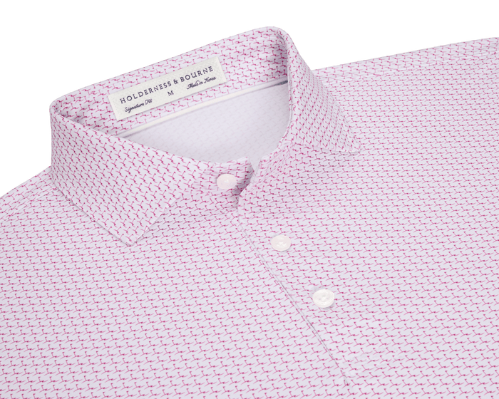 The Atwood Shirt: Cabernet features a white base with pink micro-print, white buttons, and a structured spread collar, showcasing Holderness & Bourne's signature fit.