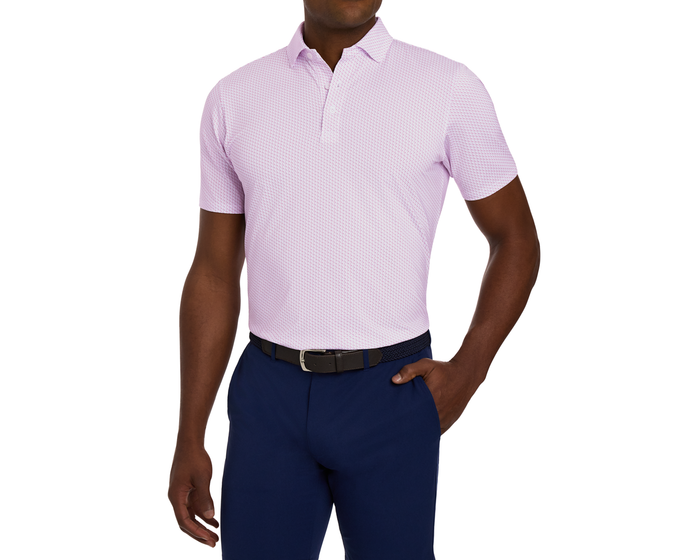Model wearing The Atwood Shirt: Cabernet, featuring a structured spread collar and performance jersey, tucked into navy trousers with a woven belt.