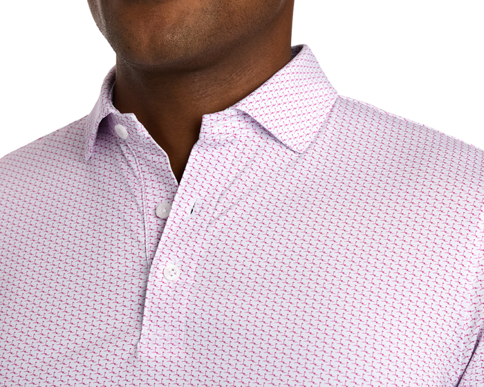 Close-up of The Atwood Shirt: Cabernet, featuring a white button-down with a fine pink geometric print, structured spread collar, and visible white buttons.