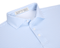 The Atwood Shirt: Horizon Blue features a light-blue button-down with a blue-plane motif, structured spread collar, and white buttons, ideal for versatile, active wear.