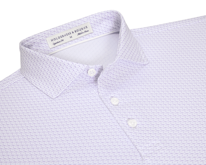 The Atwood Shirt: Tudor features a point collar, three-button placket, and herringbone print, offering comfort and performance with moisture wicking and sun protection.