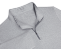 The Bell Quarter-Zip: Heathered Gray, featuring a textured knit, fold-over collar, quarter-zip placket, and long sleeves, offering sporty sophistication and versatility.