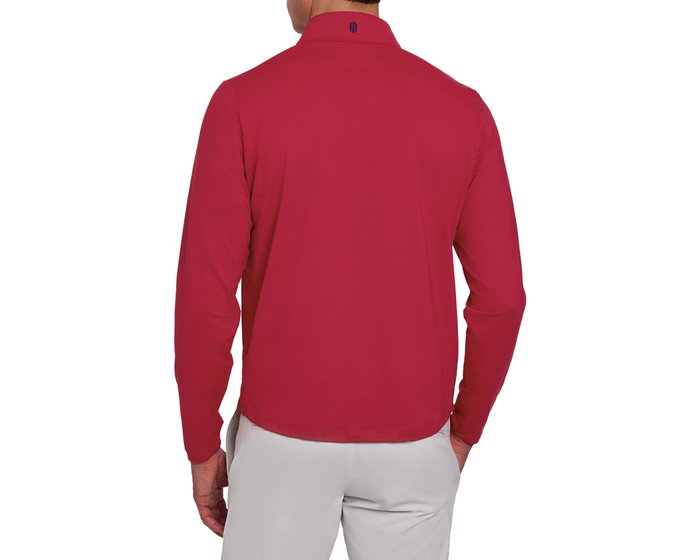 Man wearing The Bell Quarter-Zip: Heathered Liberty Red from behind, showcasing its long sleeves, lightweight fabric, and modern drop-tail silhouette against a plain background.