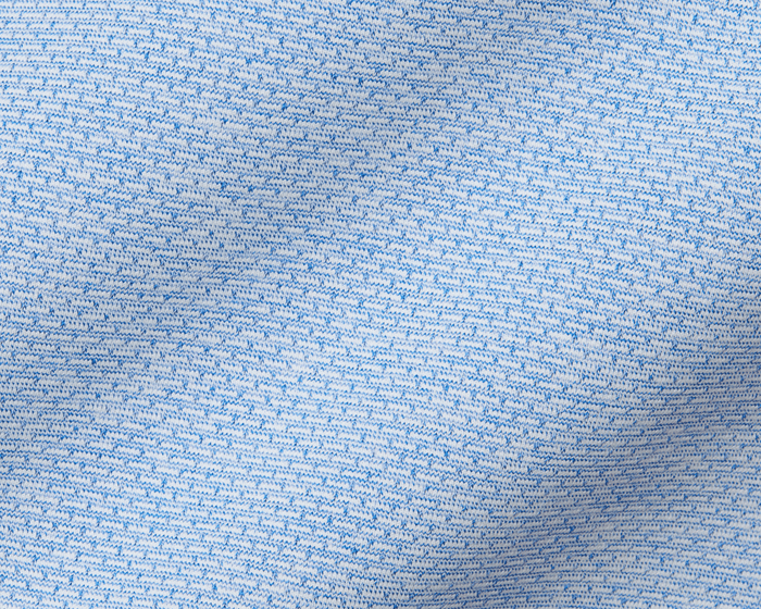 Close-up of The Bell Quarter-Zip: Heathered Vista Blue, showing intricate white and blue yarn stitches that create a textured, sporty, and sophisticated fabric.