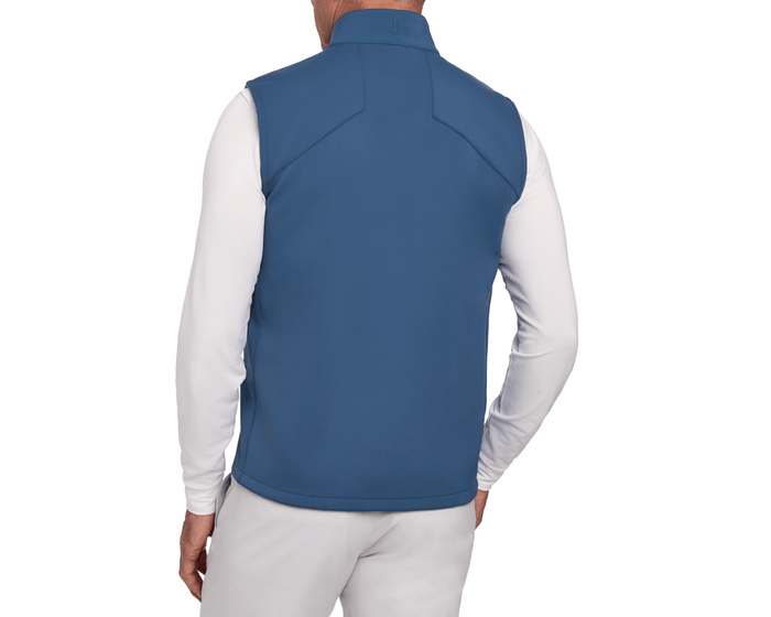 The Benton Vest: Andover displayed on a model from behind, showcasing its sleeveless design and knit back for enhanced comfort and mobility.