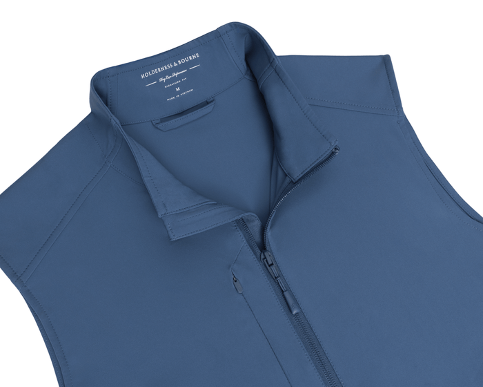 The Boyd Vest: Andover features a slate-blue, soft-shell design with a stand-up collar, chest pocket, and full front zipper, offering windproof and water-resistant protection.